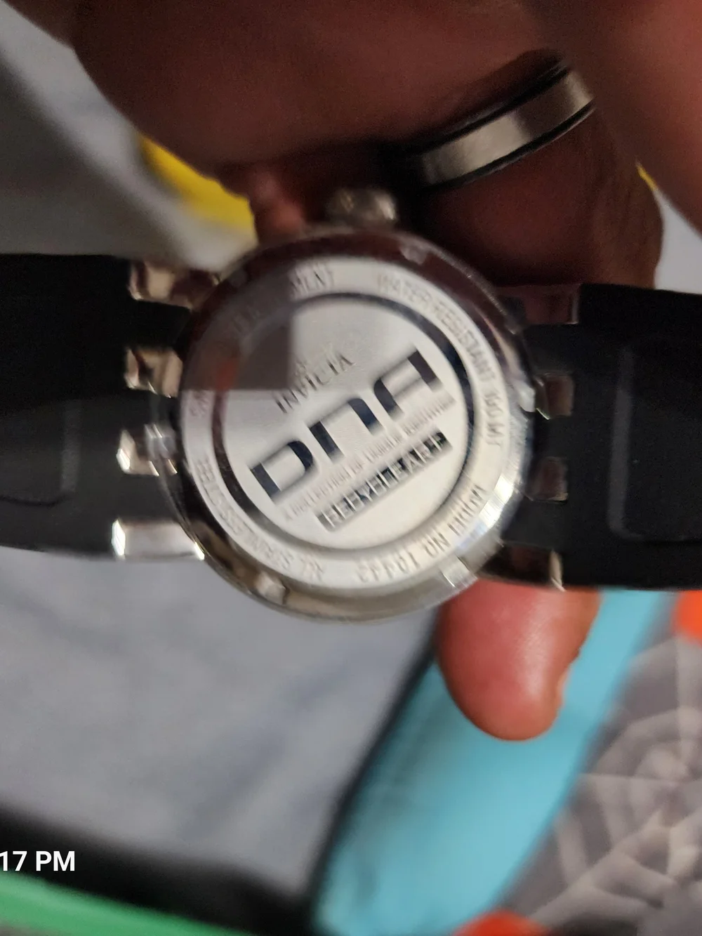Invicta Black Stainless Steel Watch with Red Dial Accent